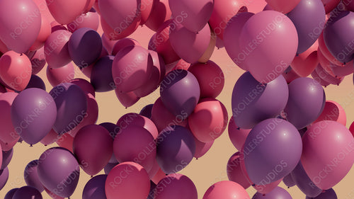 Colorful balloons rising into the in the air.