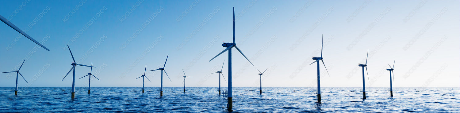 Wind Power. Offshore Wind Turbines on a Clear Evening. Environmental Electricity Concept.