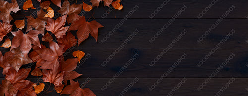 Dark wood Surface with leaf border.