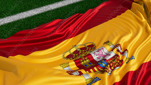 Flag of Spain on a Sports field. Grass Pitch with a Spanish Flag. Euro 2020 Football Background.