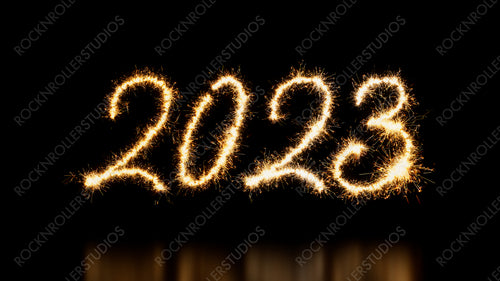 New Year Banner with 2023 Text on Black. Gold Sparkler Firework Caption.