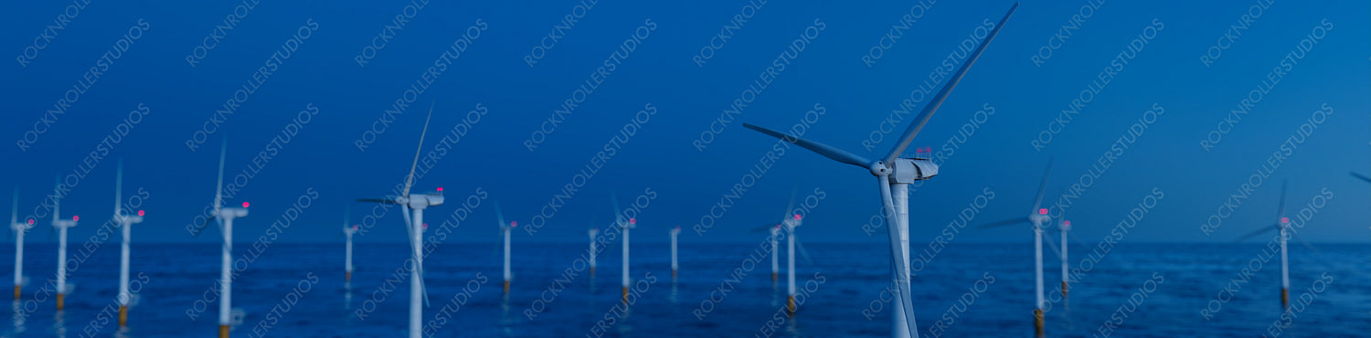 Wind Power. Offshore Wind Turbines on a Clear Evening. Sustainable Electricity Concept.