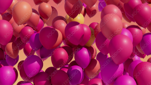 Colorful balloons rising into the in the air. Seamless loop.