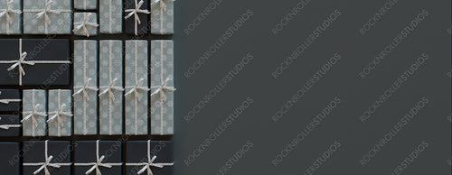 Christmas Gifts Precisely arranged in a Grid. Modern Duck Egg Blue and Black Seasonal Wallpaper with copy-space.