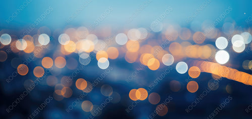 City Blurring Lights Abstract Circular Bokeh on Blue Background