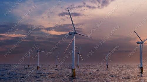 Wind Power. Offshore Wind Turbines at Dusk. Sustainable Energy Concept.