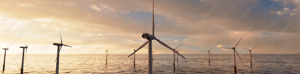 Wind Turbines. Offshore Wind Farm at Sunset. Environmental Energy Concept.