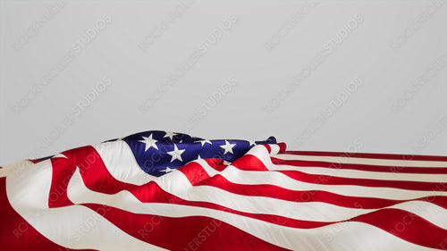 USA Flag Banner for Veterans Day Isolated on White. Authentic Holiday Background with Copy-Space.