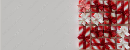 Christmas Presents Precisely arranged in a Grid. Elegant Red and White Festive Wallpaper with copy-space.