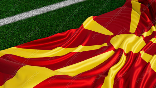 Flag of North Macedonia on a Sports field. Grass Pitch with a North Macedonian Flag. Euro 2020 Soccer Wallpaper.