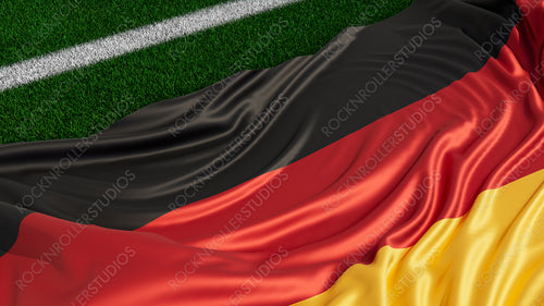 Flag of Germany on a Sports field. Grass Pitch with a German Flag. Euro 2020 Soccer Wallpaper.