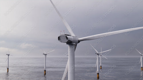 Wind Power. Offshore Wind Turbines on an Overcast Morning. Renewable Energy Concept.