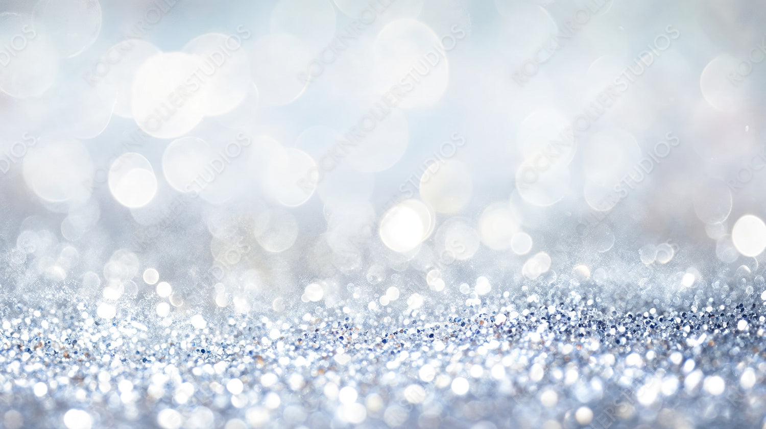 Magical Sparkling Blue Bokeh with Frosty Glitter for Winter Holiday Background