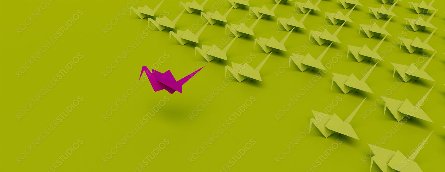 Magenta Origami Bird Leading the Group. Minimalist Business Concept on Green Background with Copy Space.