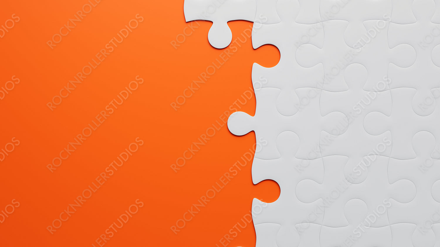 Vibrant Contrast: Orange and White Jigsaw Puzzle Pieces Showcasing Connection and Strategy