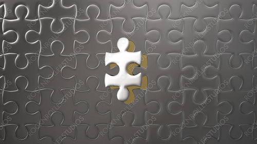 Striking 3D Jigsaw Puzzle Highlight: Silver Puzzle with Golden Highlighted Piece