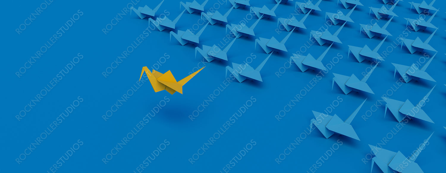 Yellow Origami Bird Leading the Group. Modern Victory Concept on Blue Background with Copy Space.