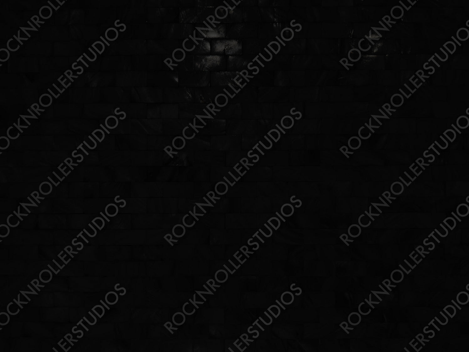 Enigmatic Black Brick Wall: A Study in Shadow and Texture