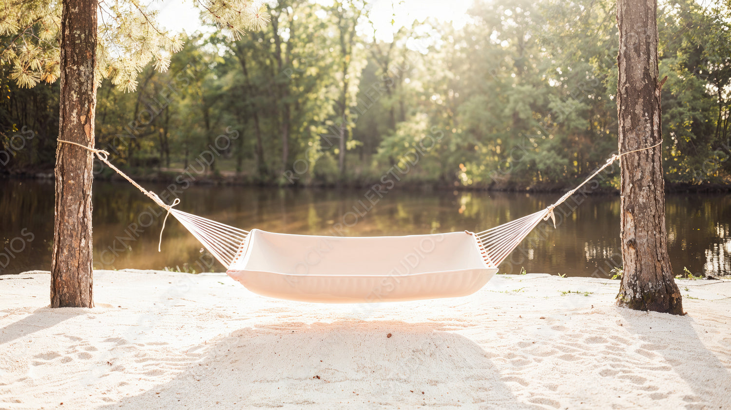 Relaxing Hammock Between Trees by Serene Lakeside in Sunlit Pastel Setting