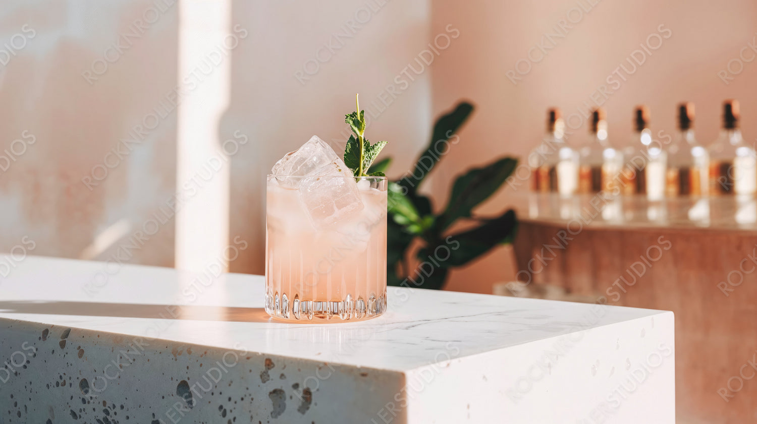 Refreshing Pink Beverage with Mint and Ice on Marble Counter