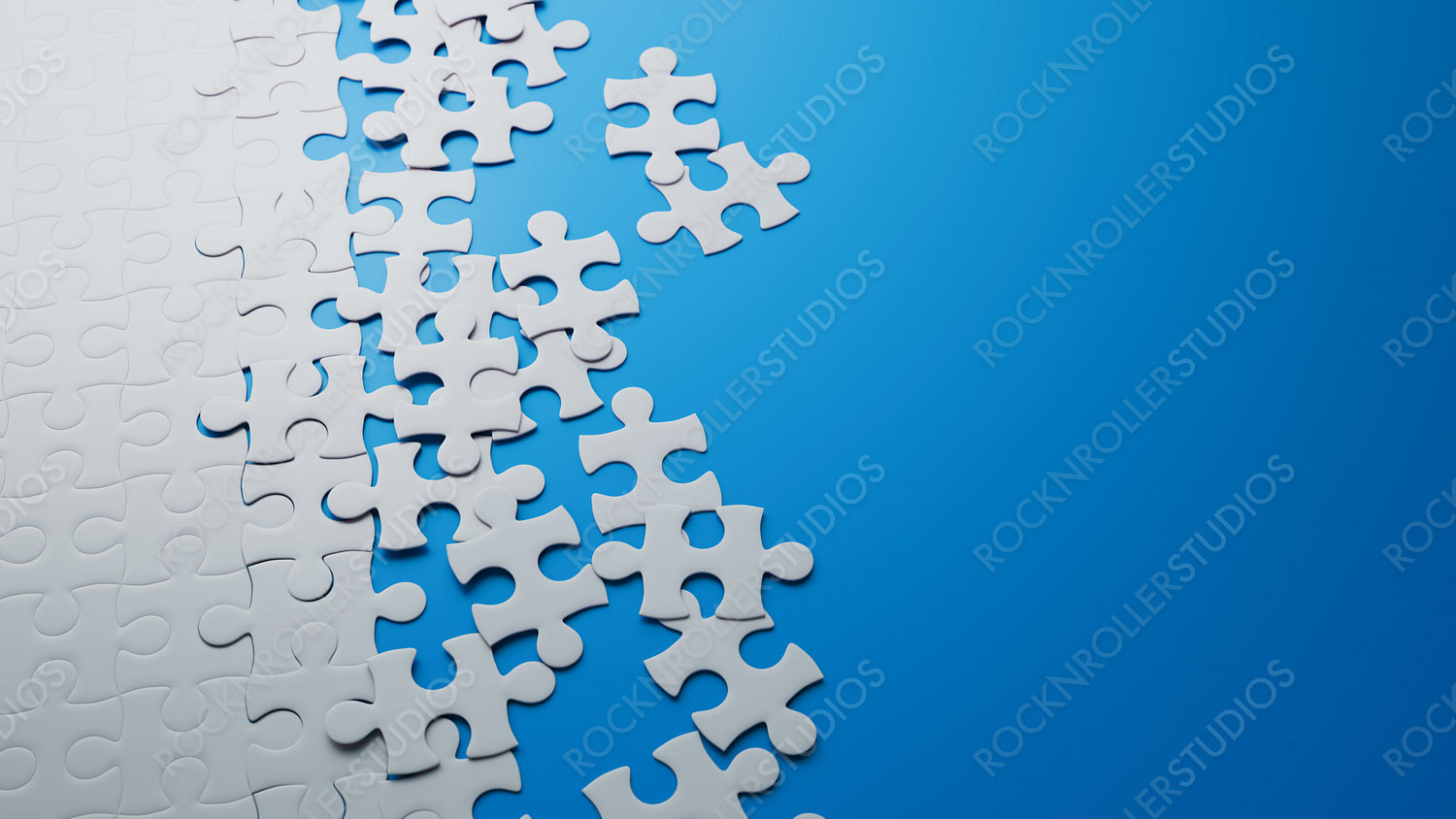 Creative Challenge: White Jigsaw Puzzle Transitioning into Blue - Symbolizing Strategy and Solution