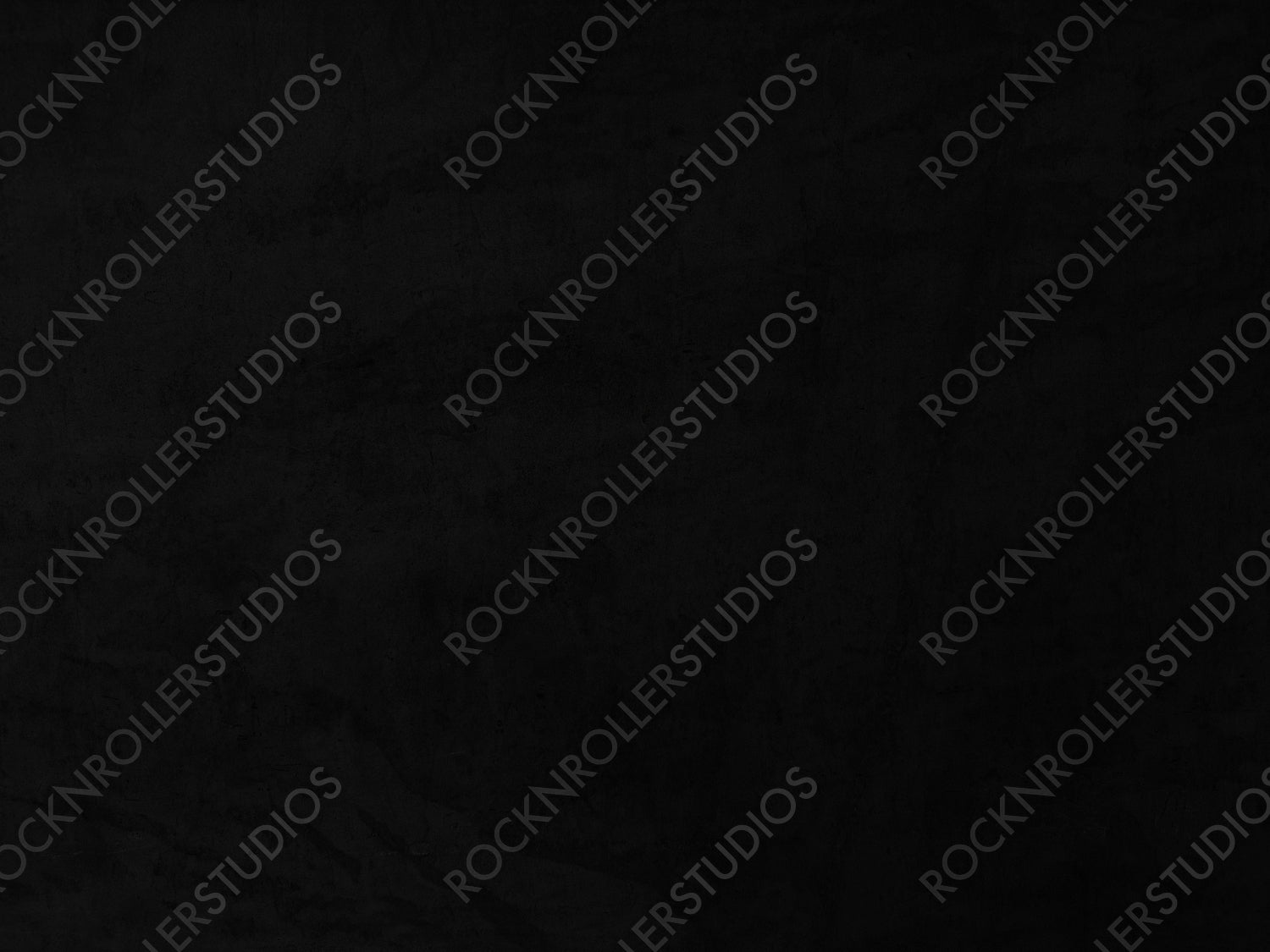 Matte Black Surface with Minimalistic Texture for Versatile Background Use