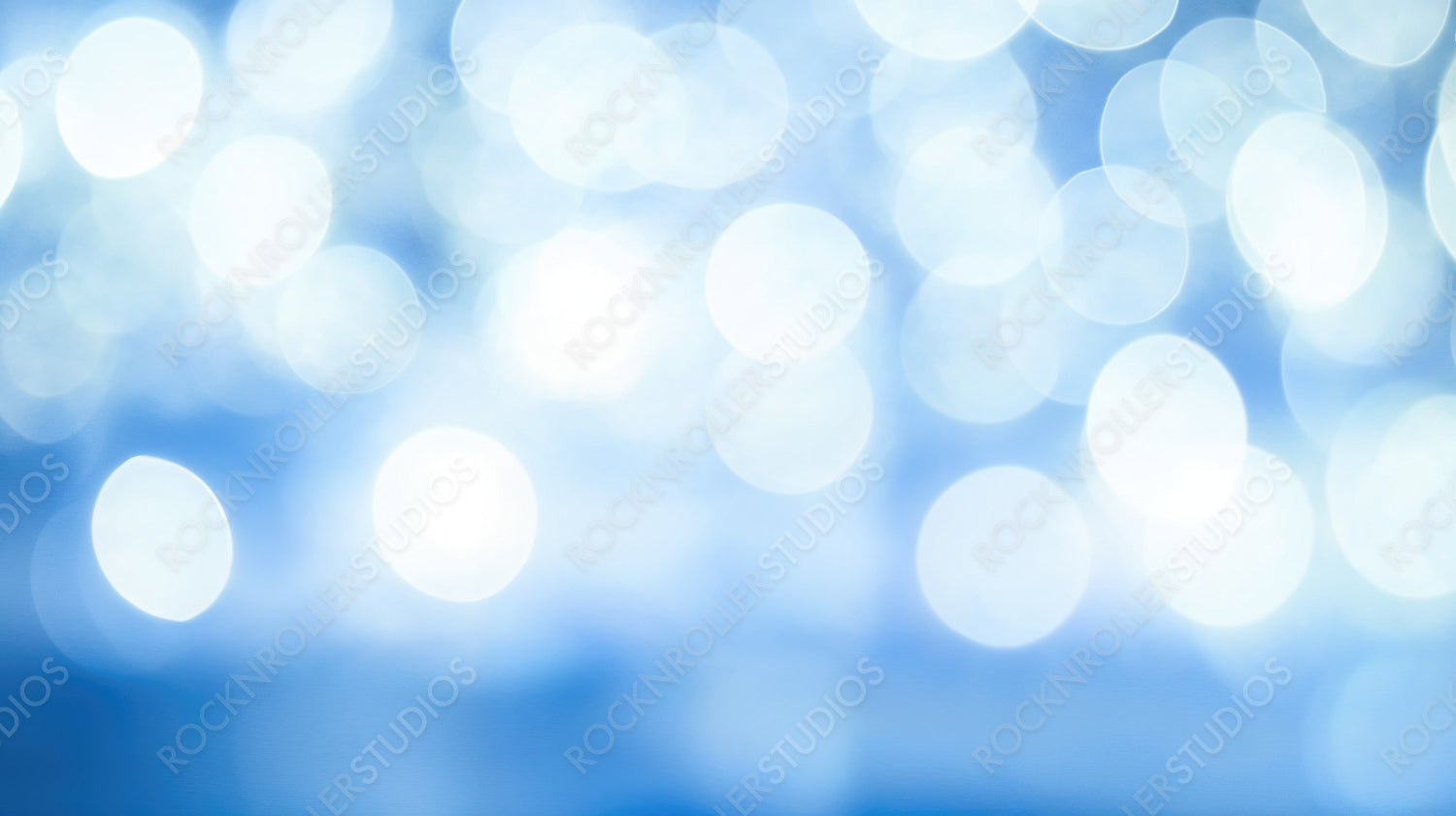 Winter Blue Bokeh Lights Shining in a Soft Frosty Glow for Seasonal Holiday Background