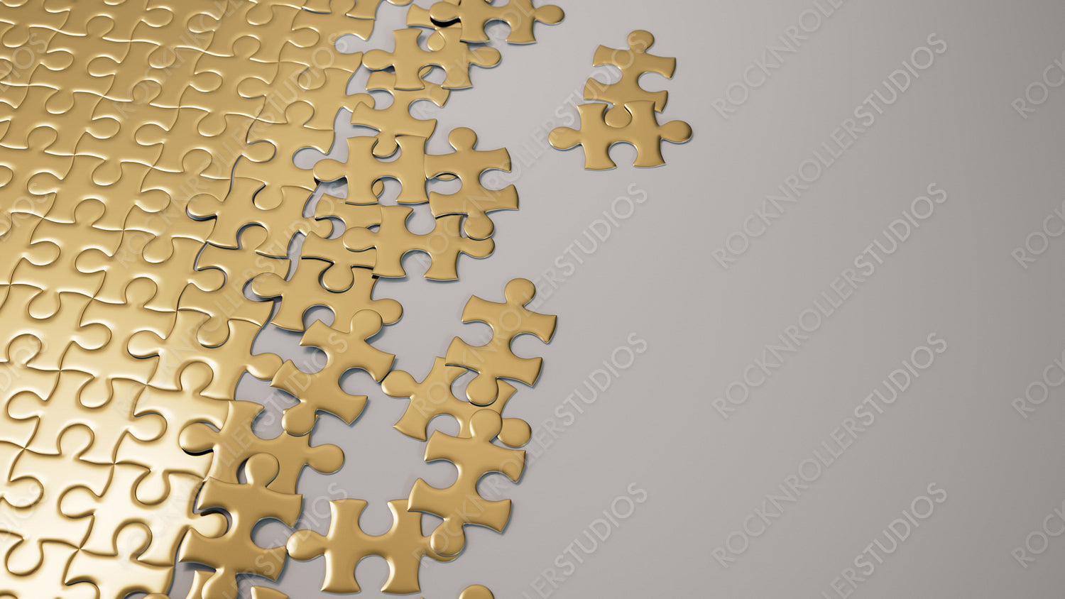 Golden Puzzle Challenge: Shimmering Pieces Assembling and Floating on a Sleek Grey Backdrop