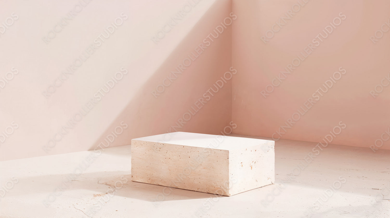 Minimalist Stone Plinth in Soft Pink Studio Setting