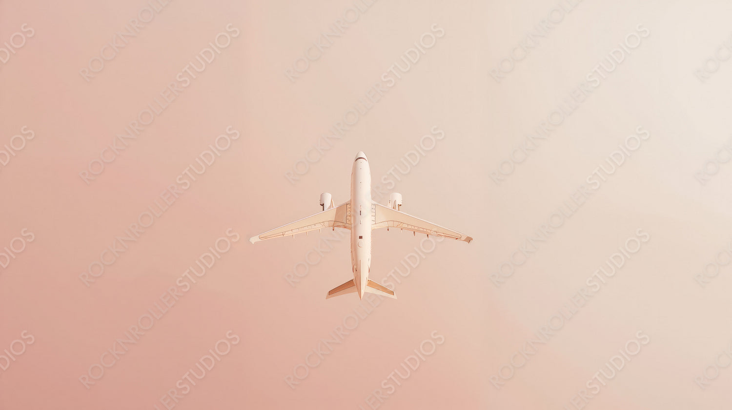 Stunning Aerial View of Airplane Soaring in Peach Sky