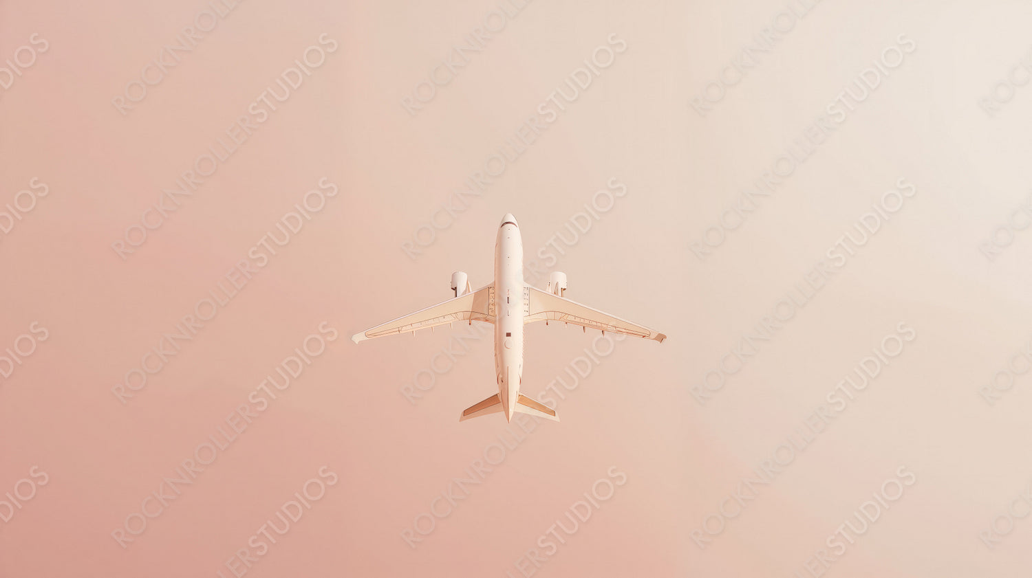 Stunning Aerial View of Airplane Soaring in Peach Sky