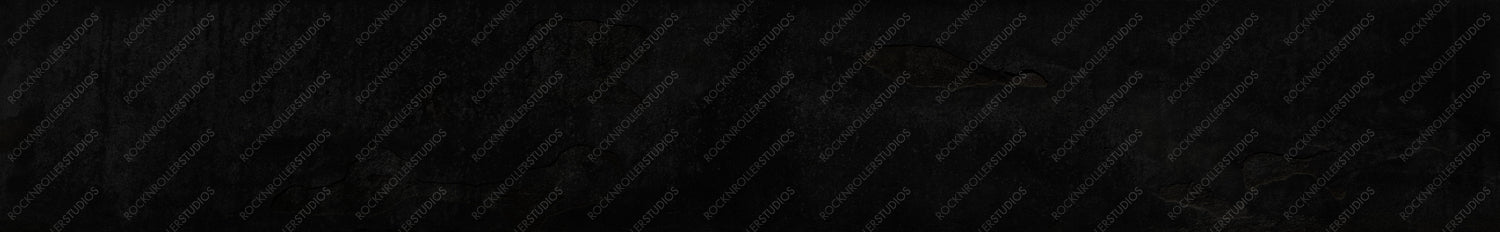 Mysterious Dark Textured Surface: Close-Up of Rough Stone or Asphalt