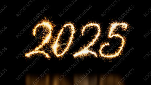 New Year Banner with 2025 Text on Black. Gold Sparkler Firework Caption.