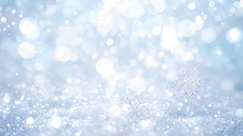 Frosty Tree Branches with Glowing Snowflakes and Winter Bokeh Background