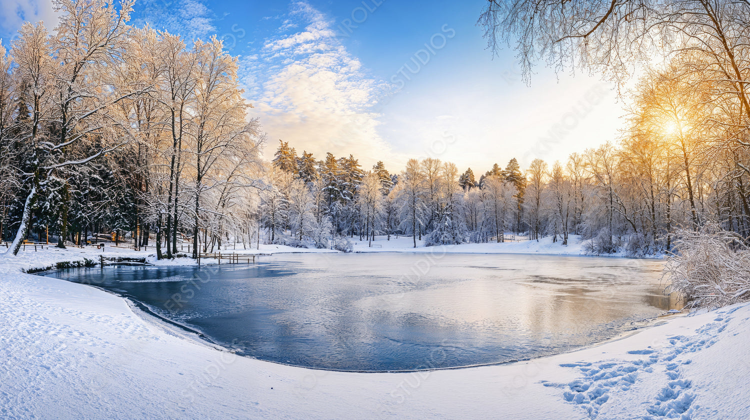 Tranquil frozen lake surrounded by snow-covered trees under a vibrant winter sky