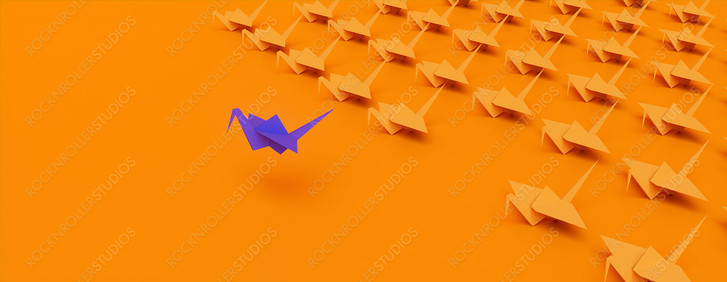 Blue Origami Bird Leading the Group. Minimalist Manager Concept on Orange Background with Copy Space.
