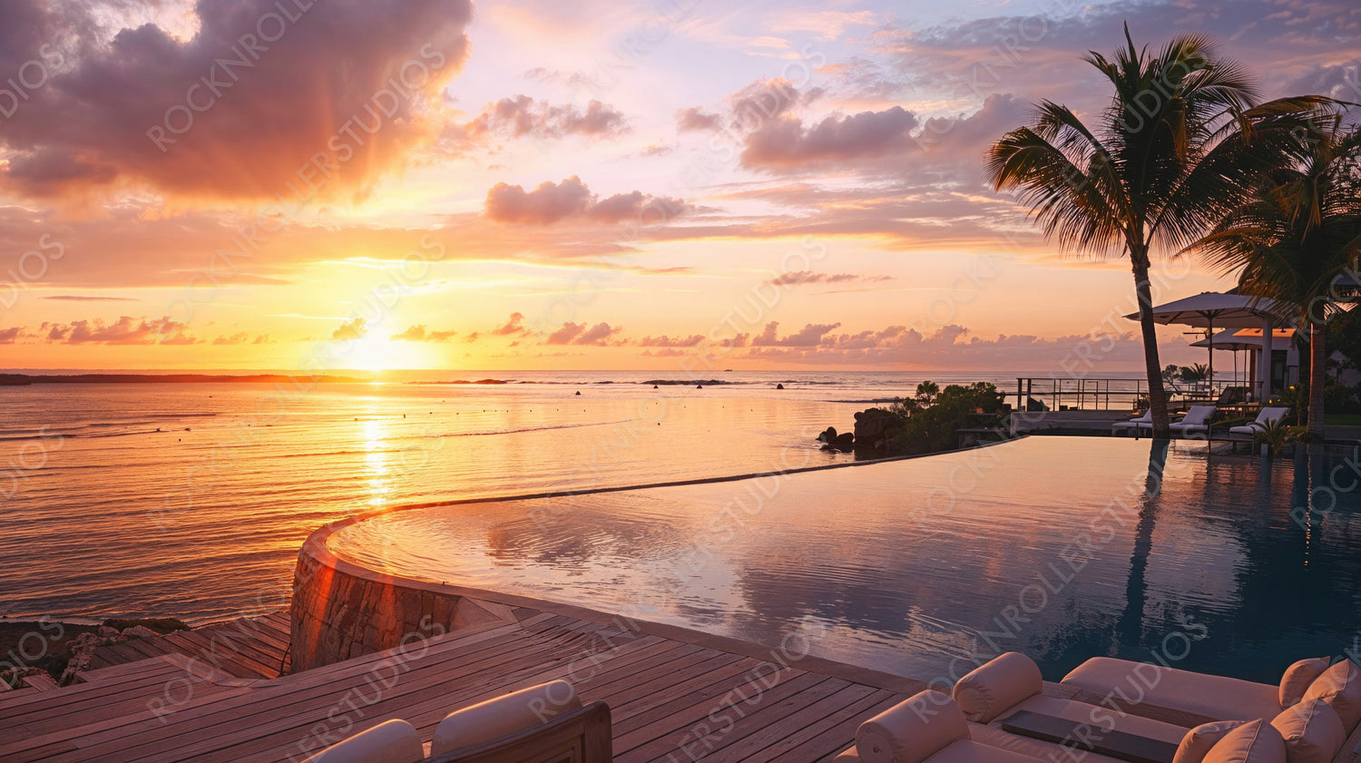 Infinity Pool with Sunset Over Ocean