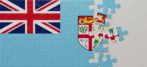 Union of Traditions: UK and Fiji Flags Merge in a Jigsaw Puzzle of Heritage and Harmony