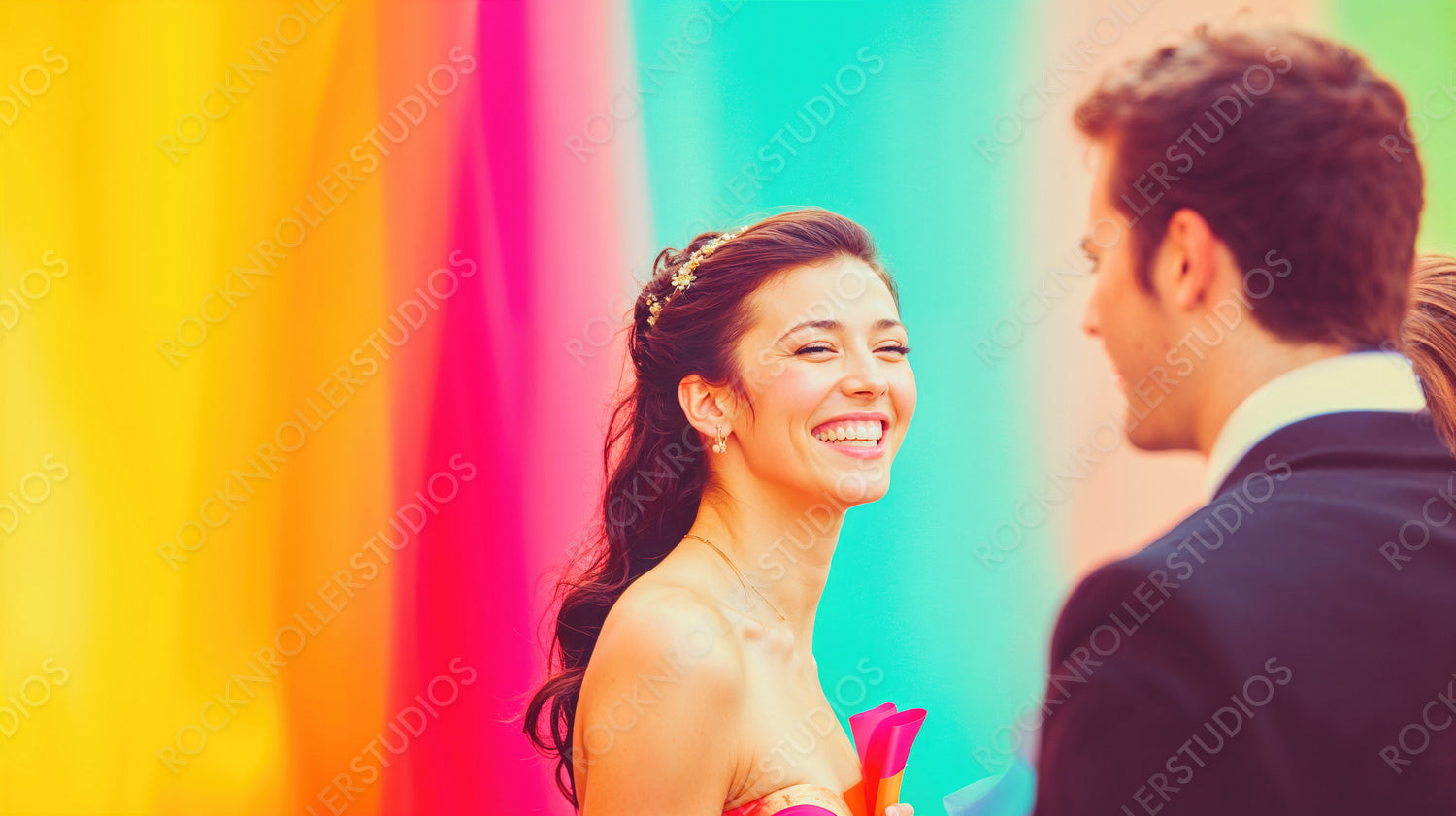 Radiant Love: Joyful Couple at a Colorful Wedding Celebration