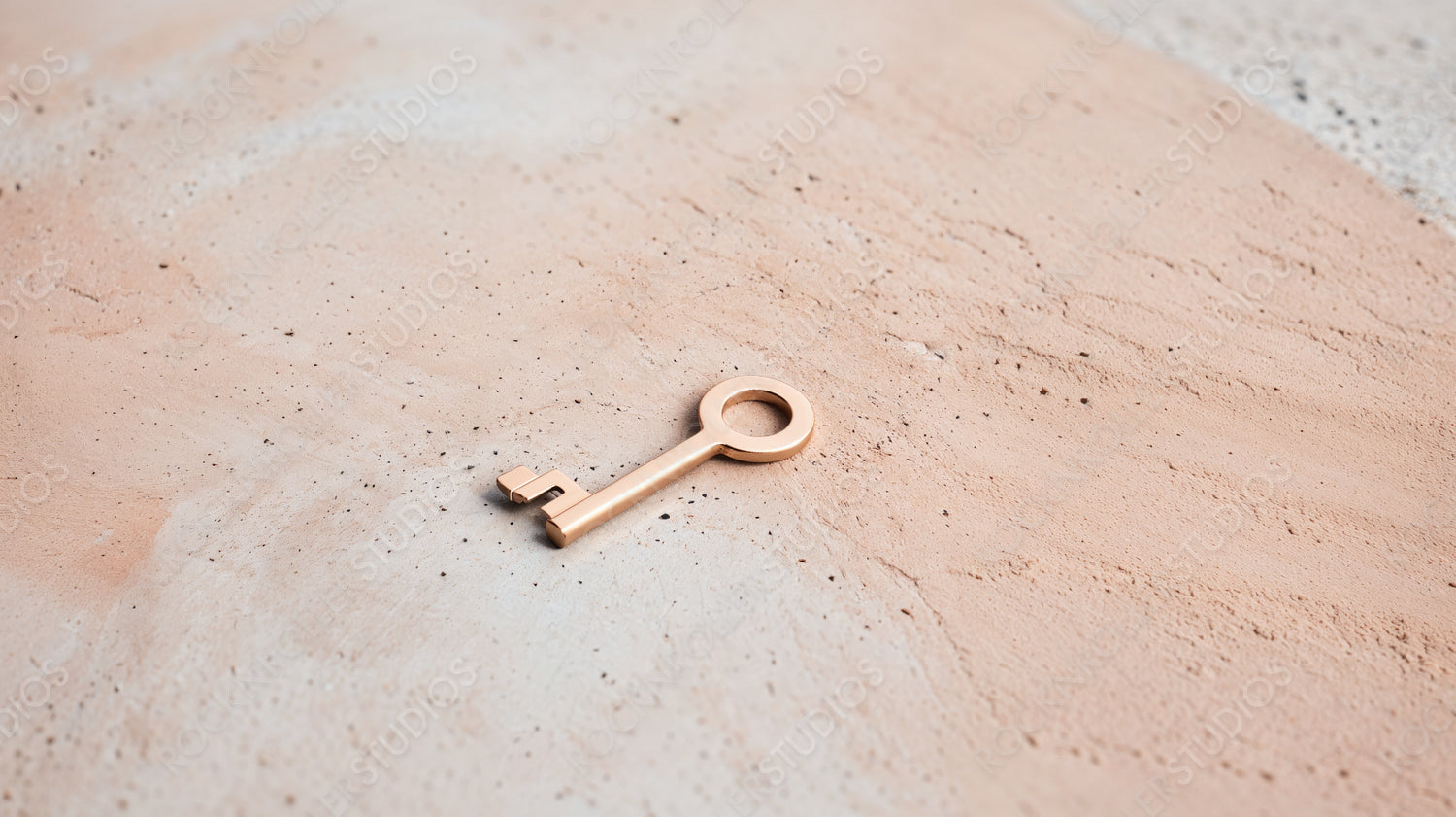 Golden Key on Pink Concrete Surface - Symbol of Success and Opportunity