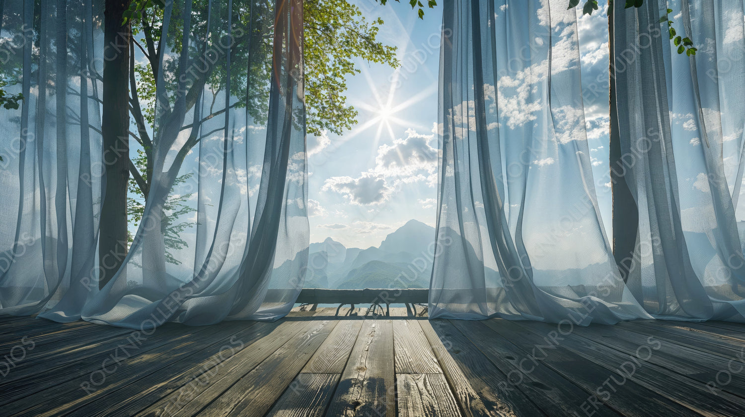 Sunlit room with flowing curtains and a breathtaking view of nature outside