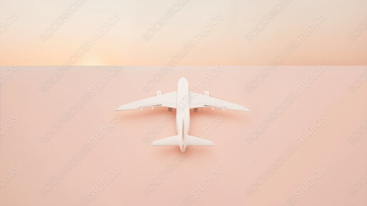 Airplane Model on Minimalist Pink Background