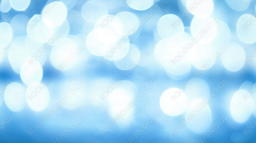 Winter Blue Bokeh Lights Shining in a Soft Frosty Glow for Seasonal Holiday Background