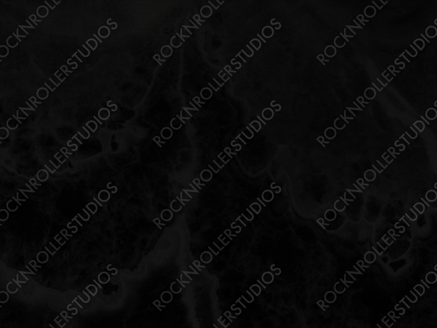 Minimalist dark textured stone surface with natural grain and depth, ideal for moody interiors and sleek designs.