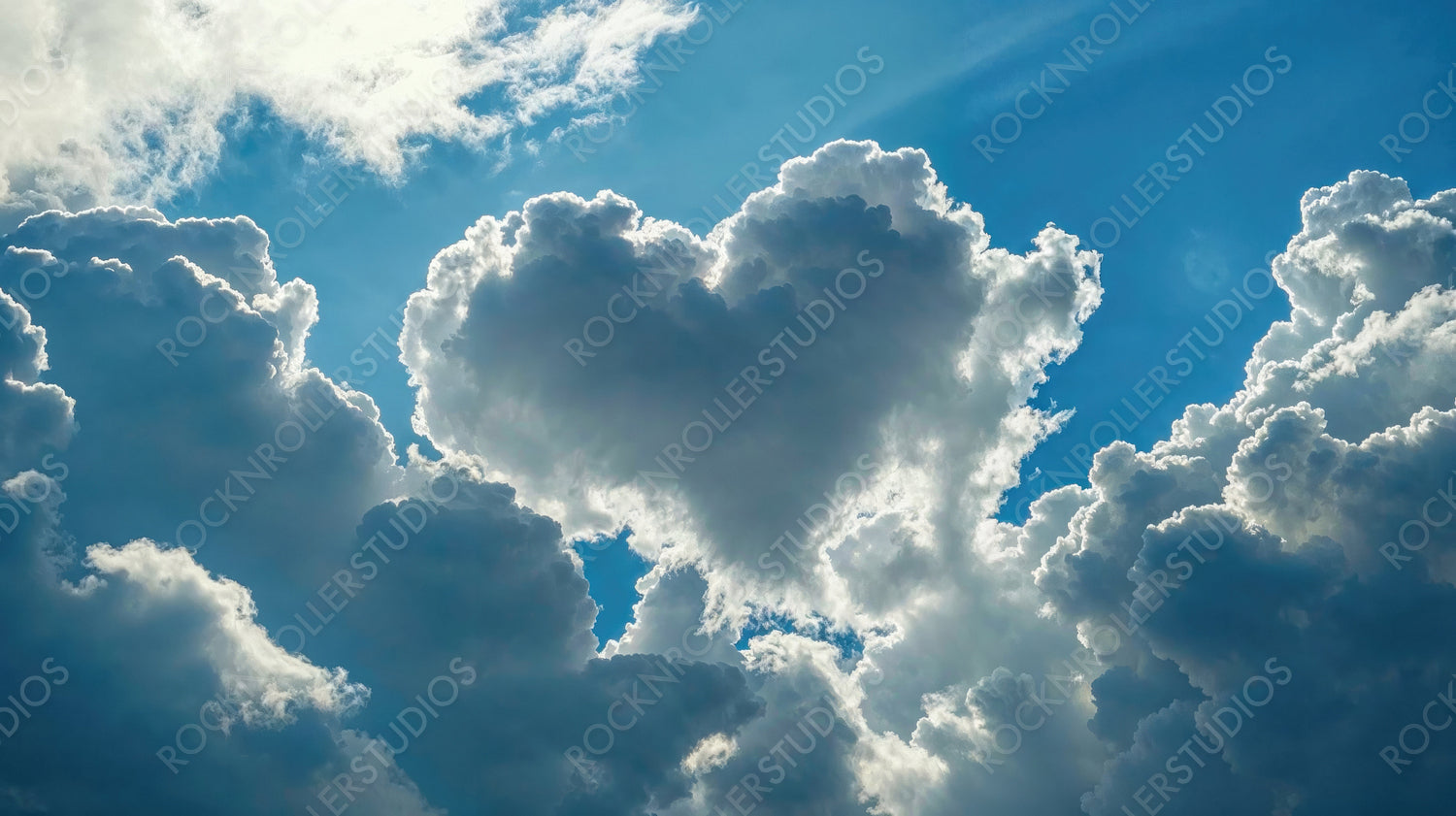 Beautiful Fluffy Clouds in the Shape of a Love Heart. Valentine’s Day Background.