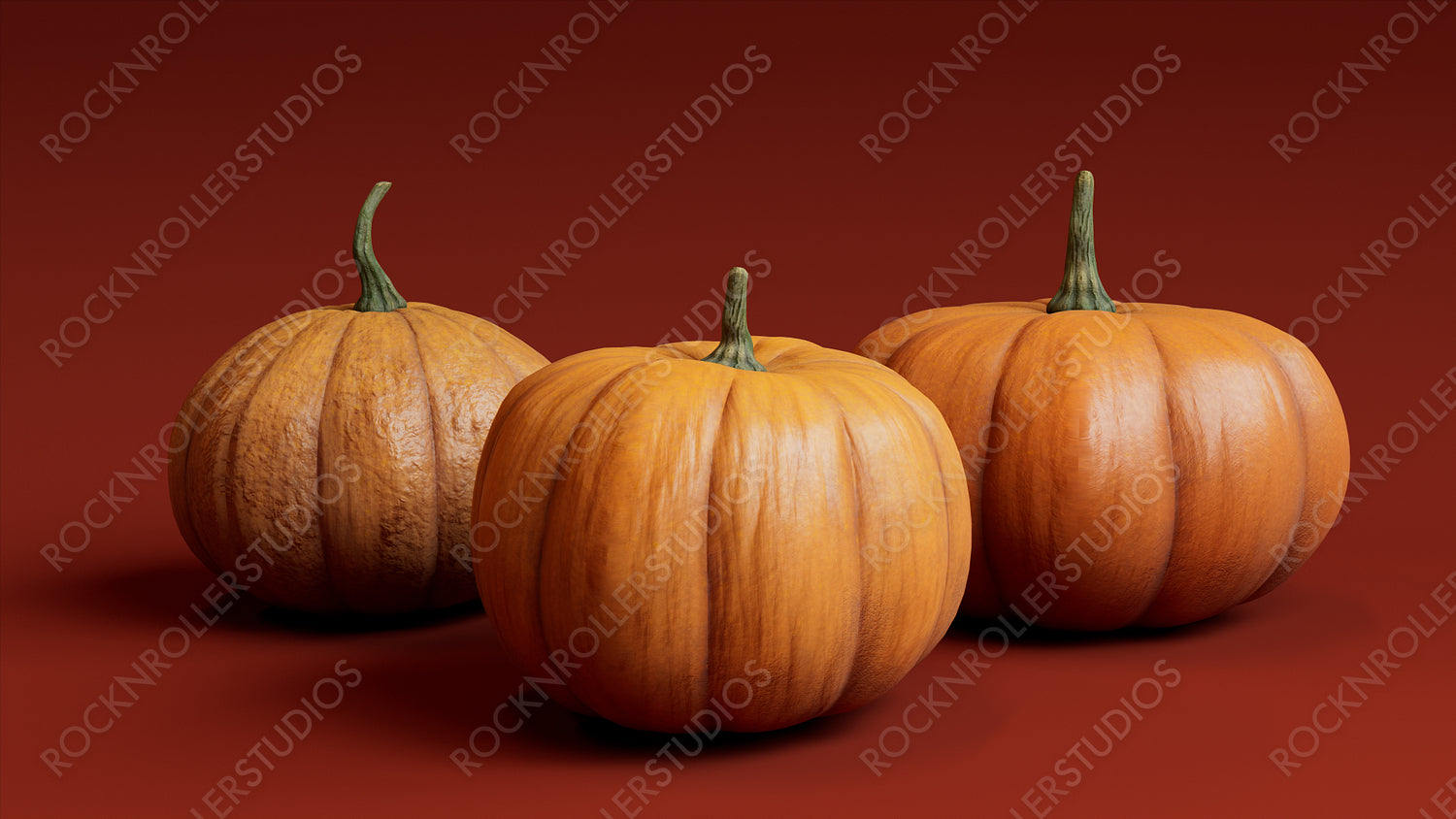 Seasonal background Wallpaper. Trio of Pumpkins on Burnt Orange color. Fall Concept.