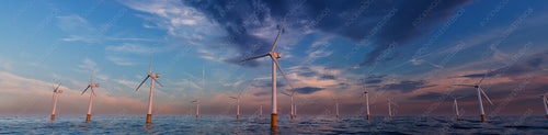 Wind Power. Offshore Wind Turbines at Dusk. Environmental Energy Concept.