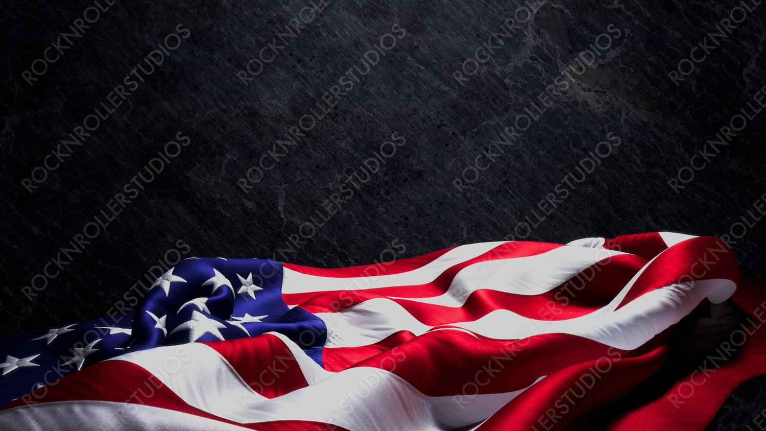Independence Day Banner. Authentic Holiday Background featuring USA Flag on Black Rock with Copy-Space.