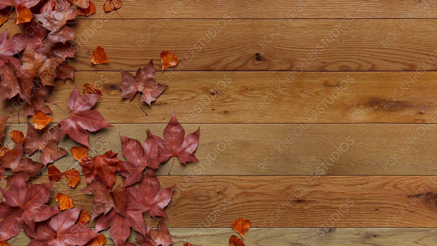 Top down view of Natural wood Tabletop with leaves.