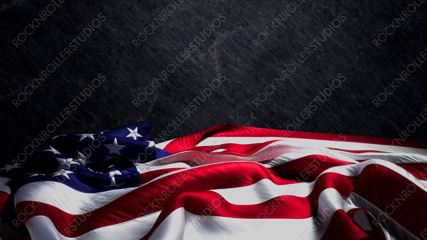Independence Day Banner with American Flag, Black Rock Background and Copy-Space.